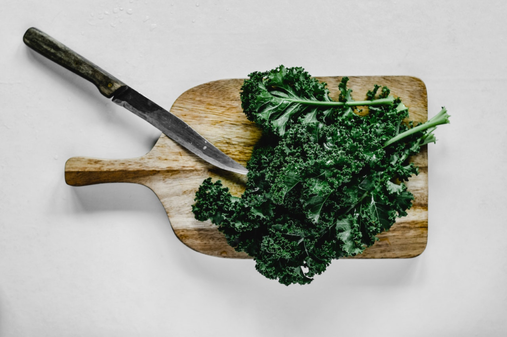 Kale on a cutting board.
